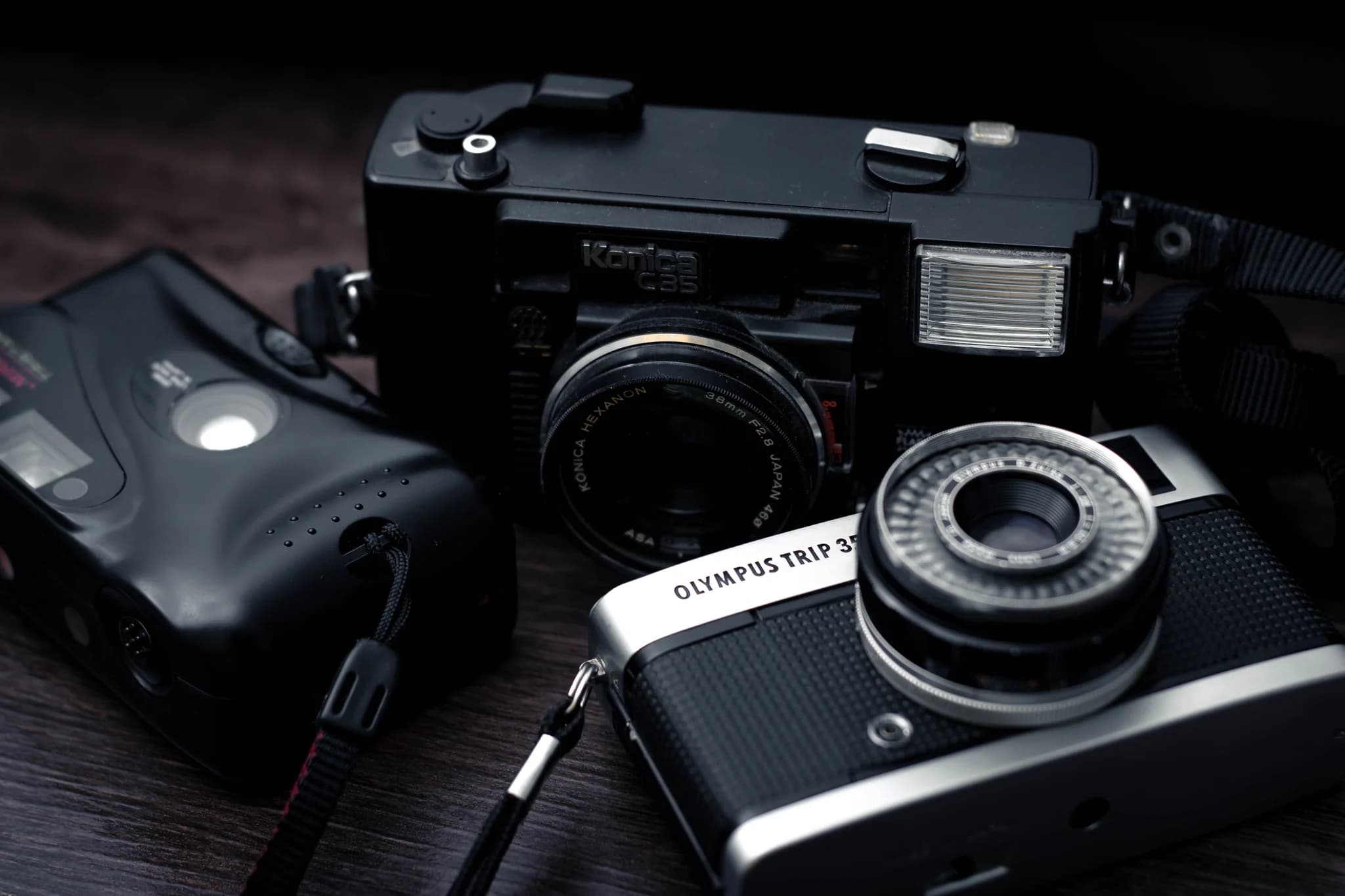 White product flatlay with headphones and camera — optimized